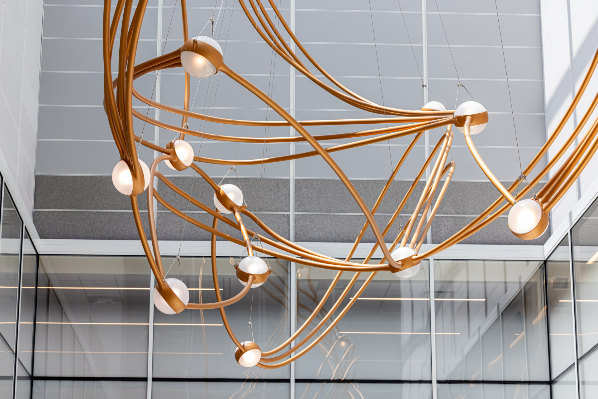 Wide view of the Constellations sculpture suspended in the atrium