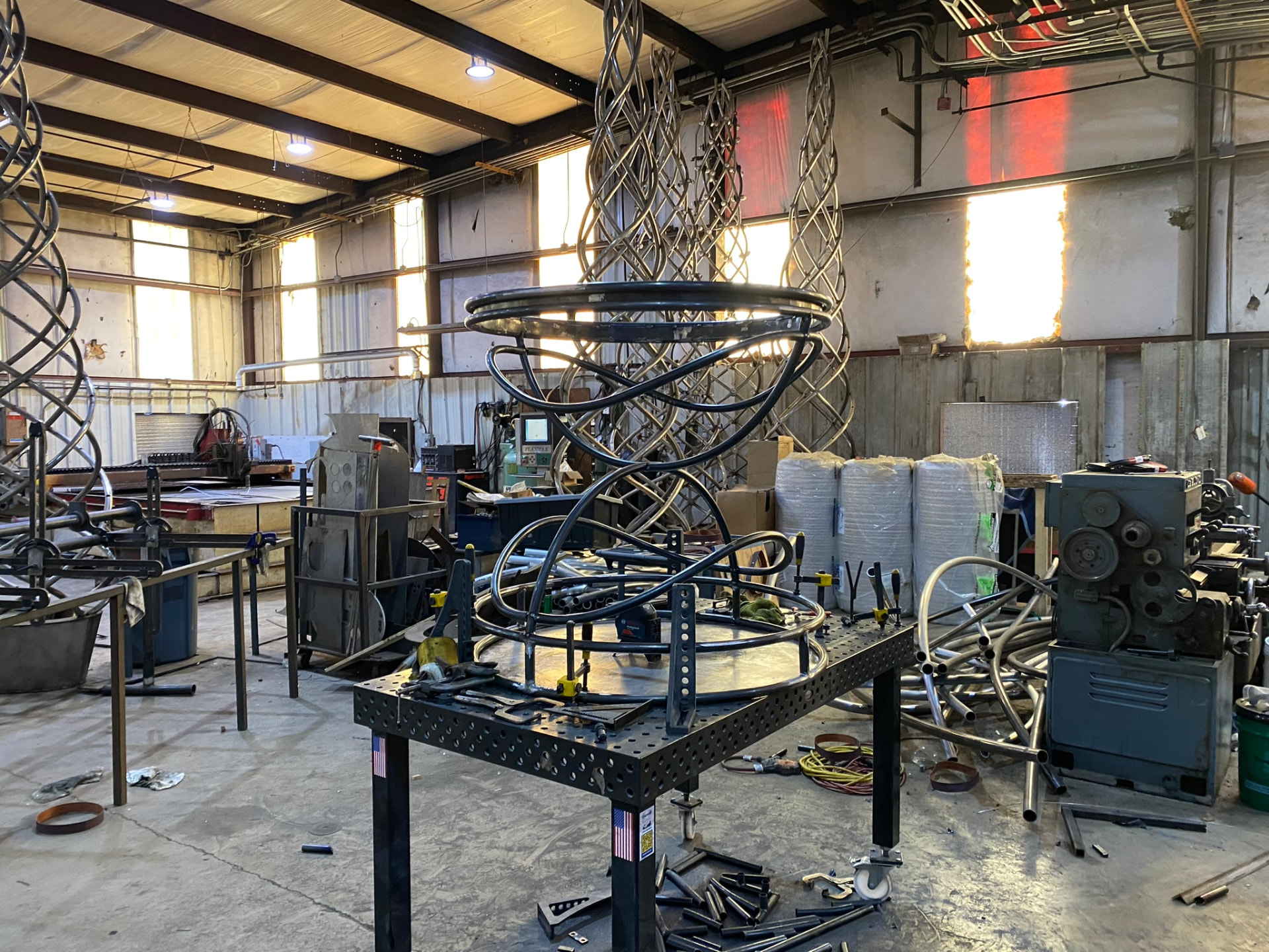 Hero shoe pedestal armature taking shape on the fixture table in the shop
