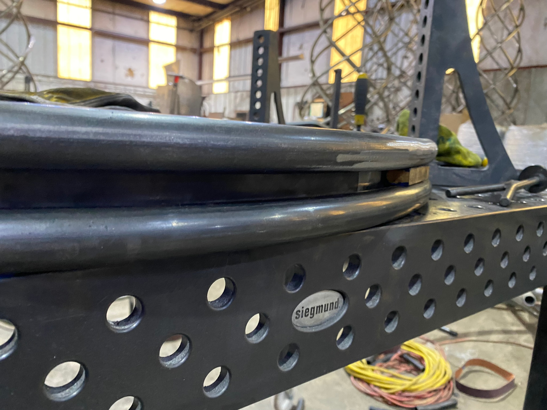 Close view of a ground weld joint on the pedestal ring on the Siegmund table