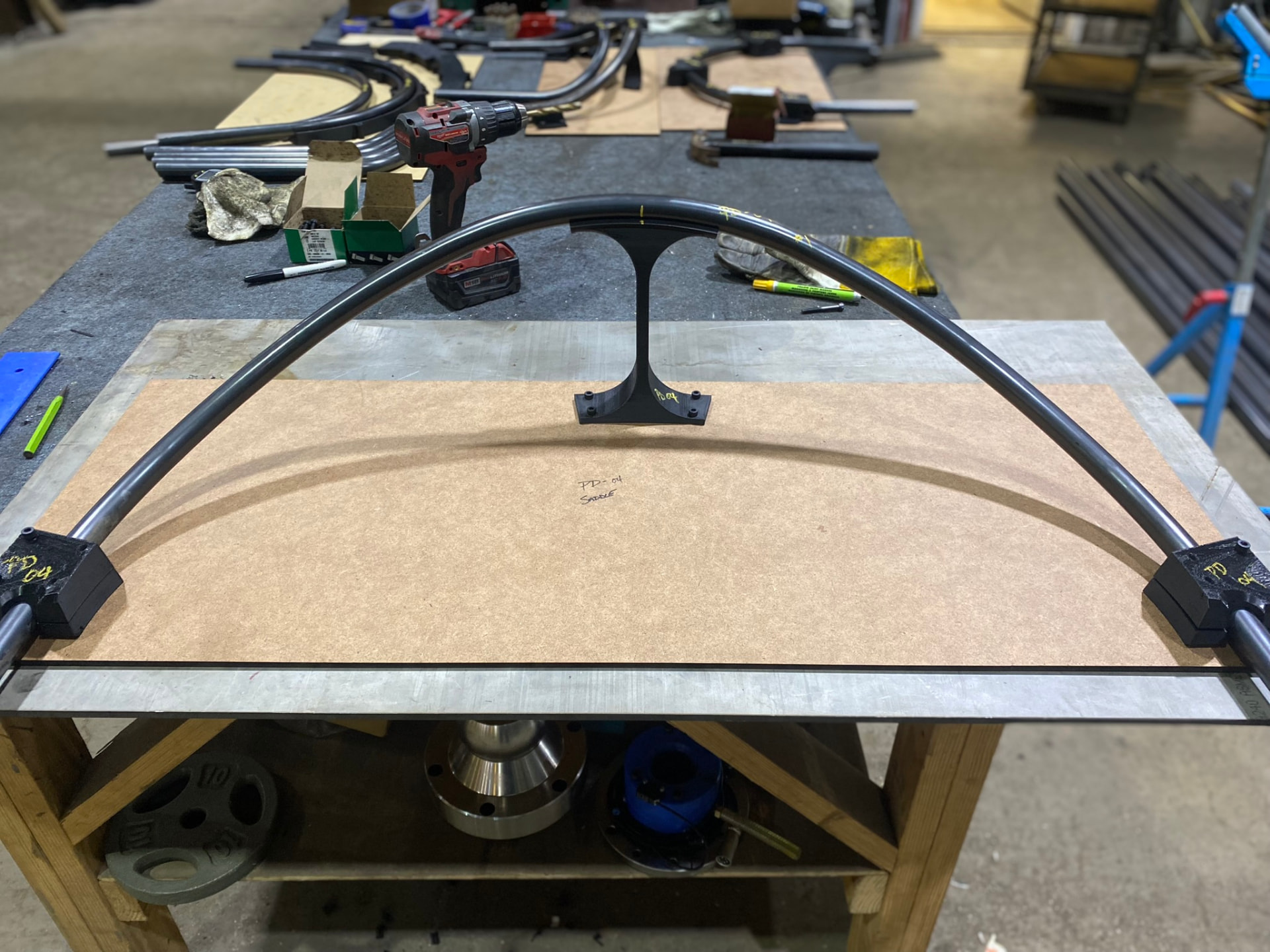 PD-04 pedestal arc set in its welding fixture with center saddle support