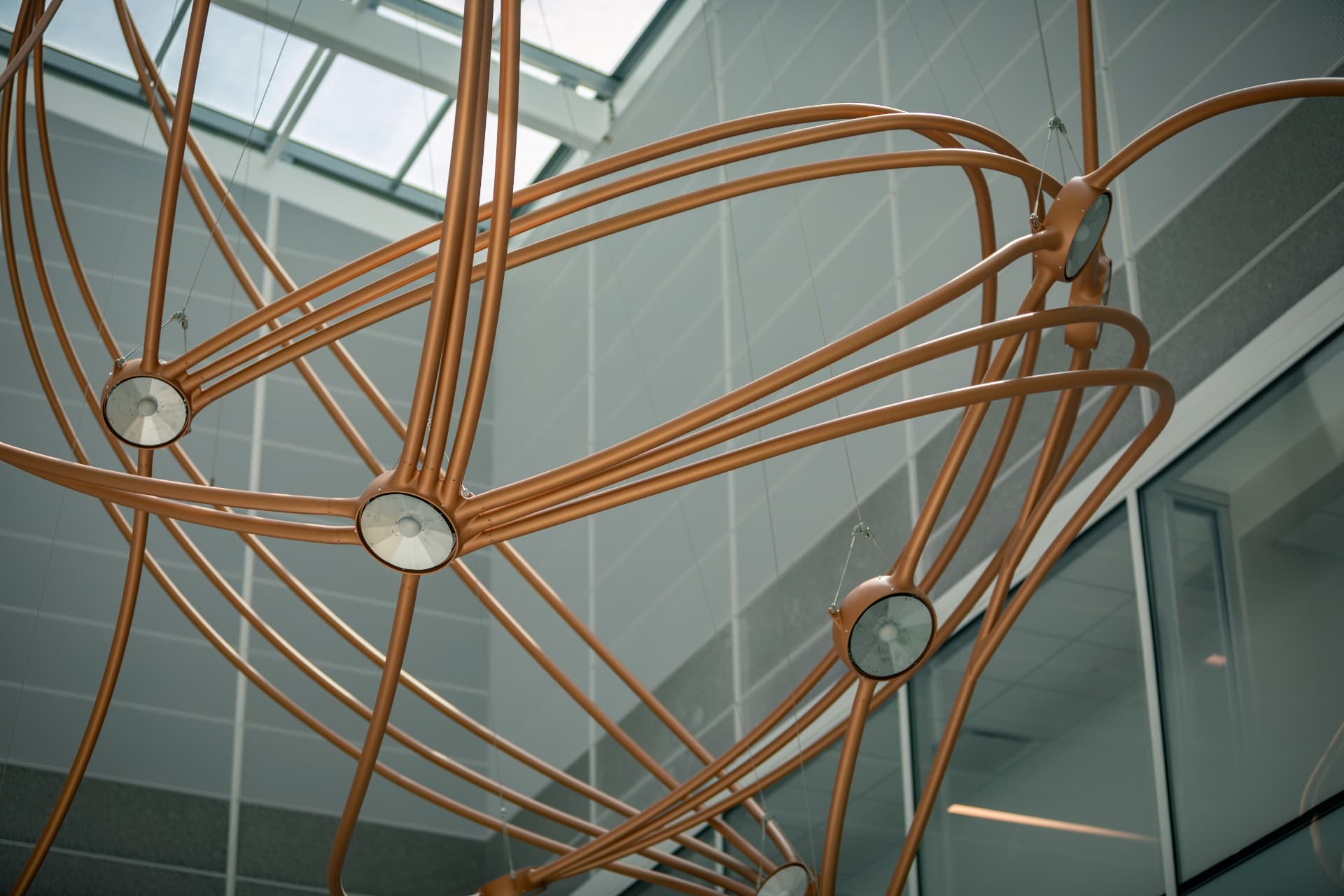 Copper tube geometry with star node lenses installed beneath the skylight